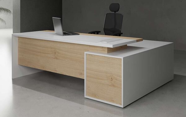 Juno L Shaped Executive Desk with white legs featuring lockable drawers and open shelves, designed for modern executive workspaces.